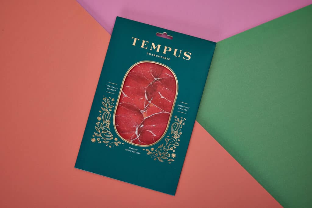 Tempus Foods charcuterie packaging wallet with gold foil print