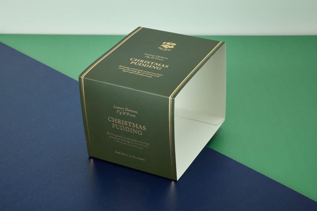The Newt Christmas Pudding Food Sleeve Packaging with Foiling